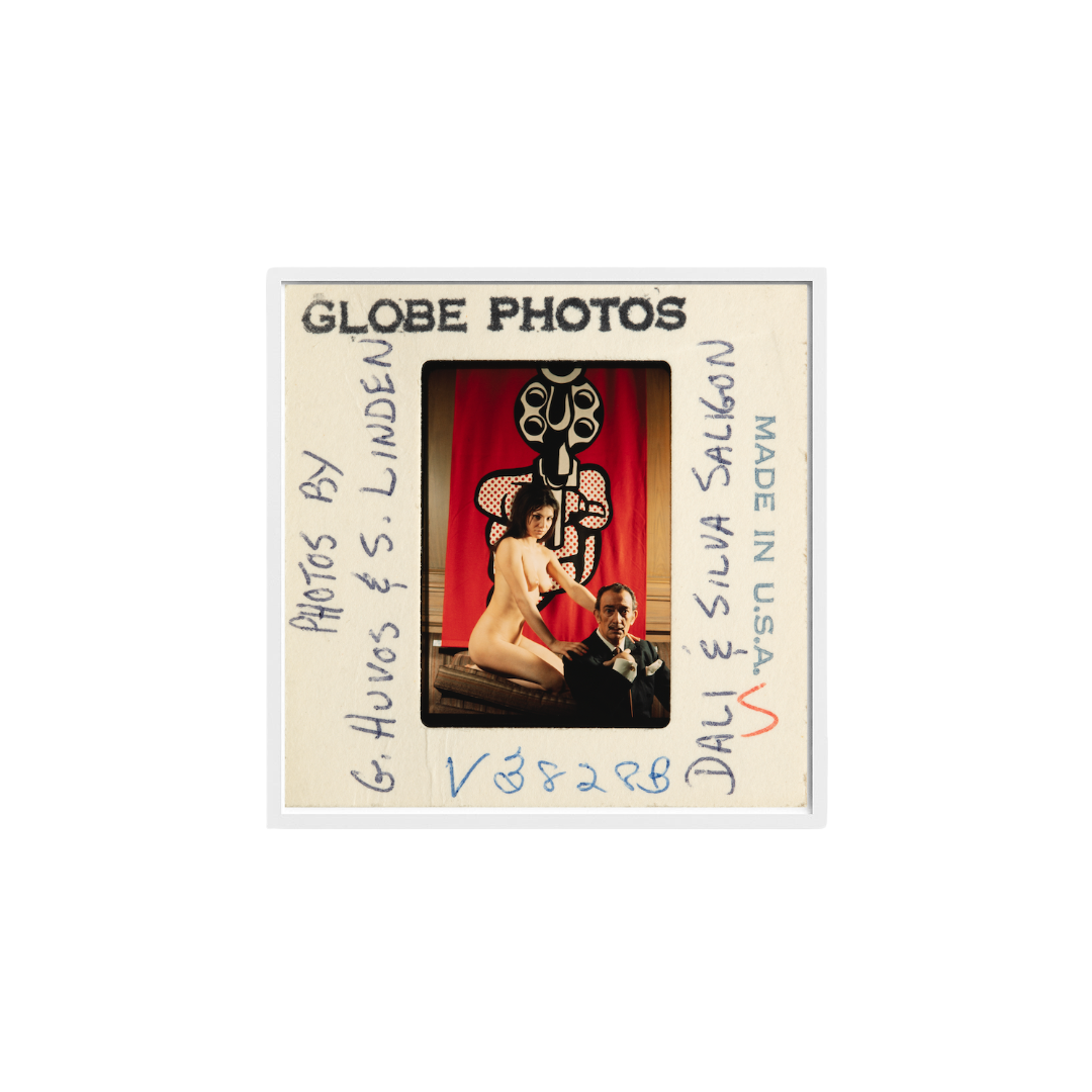 Salvador Dali & Silva Saligon in front of Roy Lichtenstein's Pistol